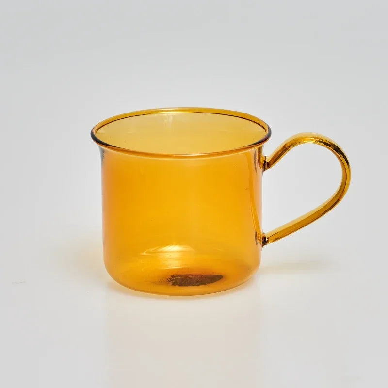 Amber glass mug on a white background