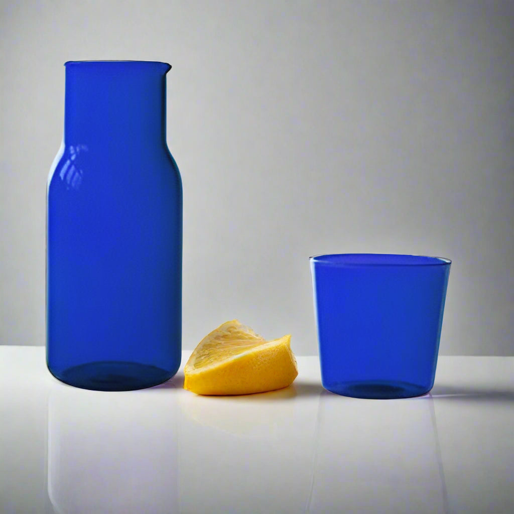 Blue glass container with dimensions labeled