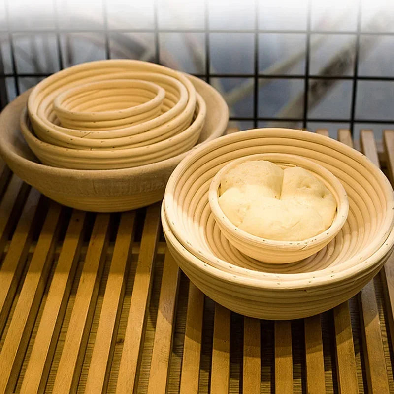 Set of woven baskets on a wooden surface with a tiled wall background