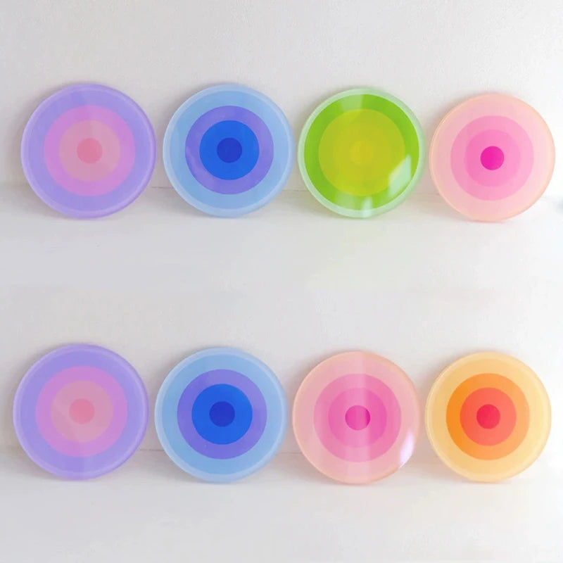 Set of colorful circular objects with gradient colors on a white background