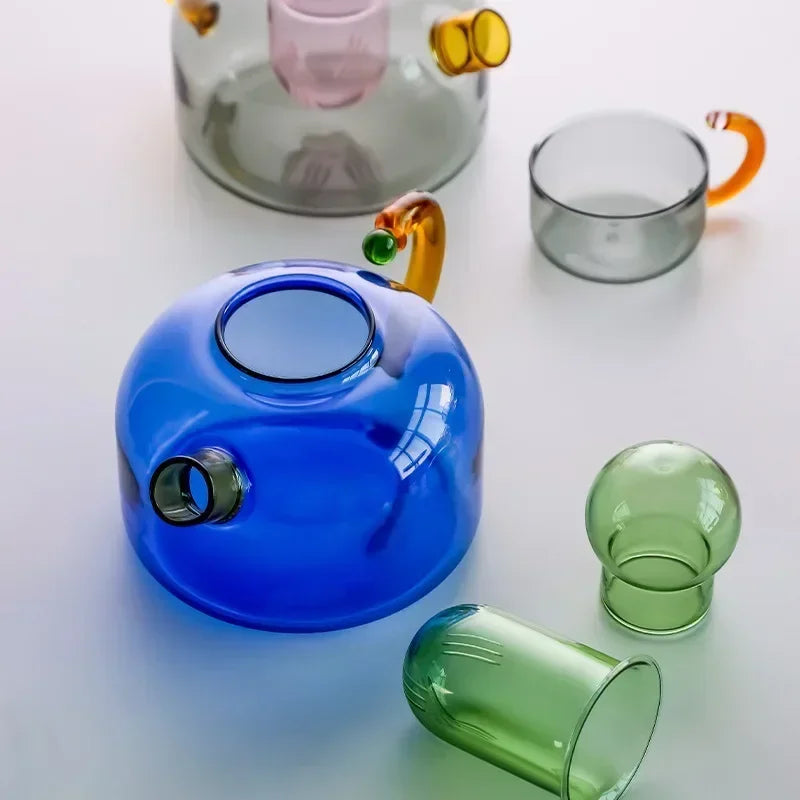 Colorful glass tumblers on a light background