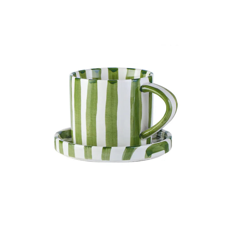 Green and white striped coffee cup with dimensions on a white background
