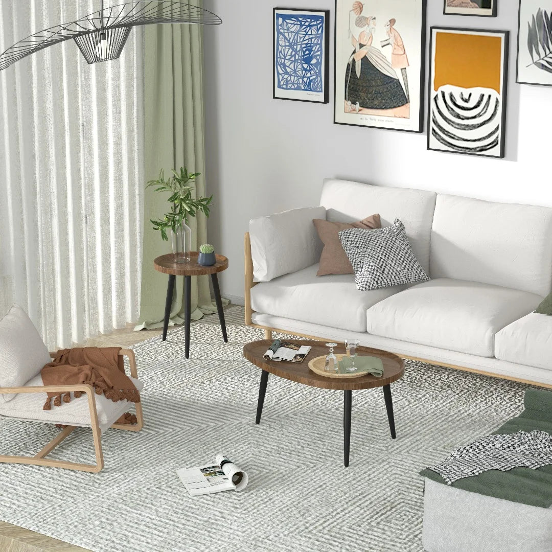 Modern living room with a white sofa, coffee table, and decorative pillows.