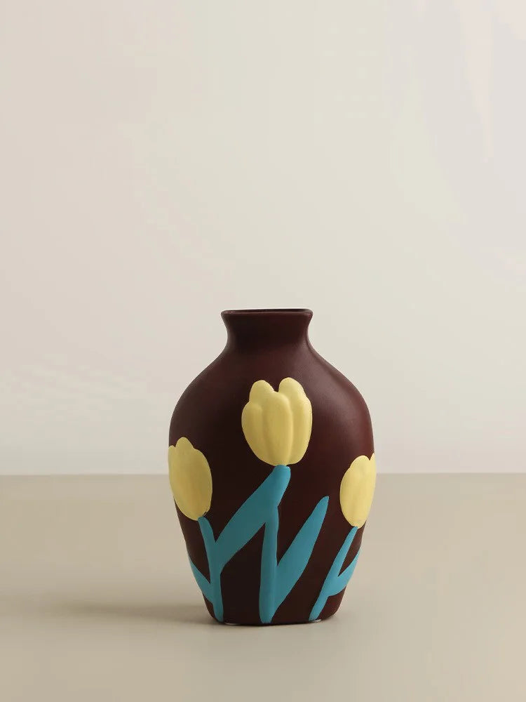 Vase with yellow tulip design on a beige background