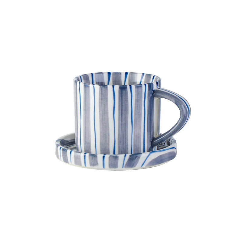 Blue and white striped coffee cup and saucer with dimensions on a white background