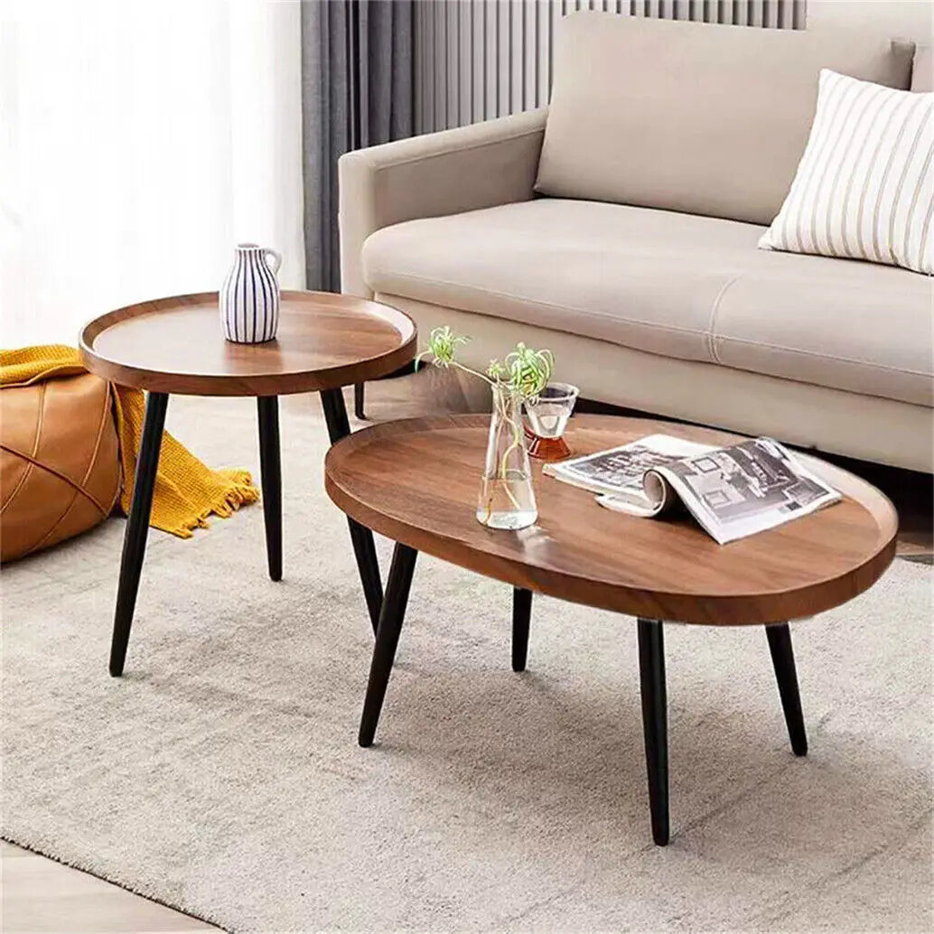 Wooden coffee table with a vase and newspaper in a living room setting