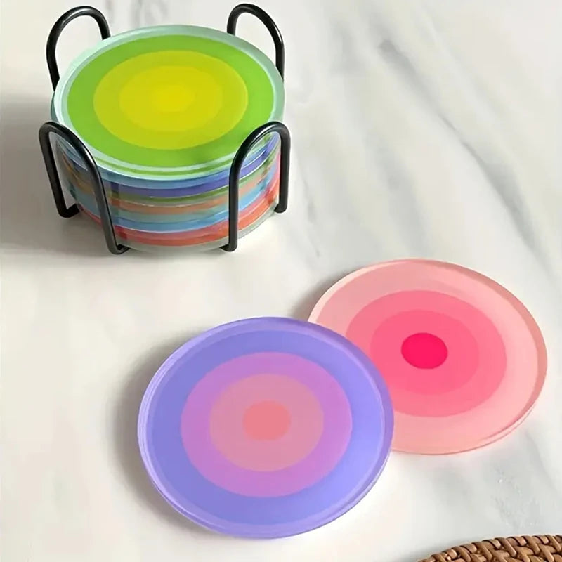 Colorful silicone coasters with a stand on a white background