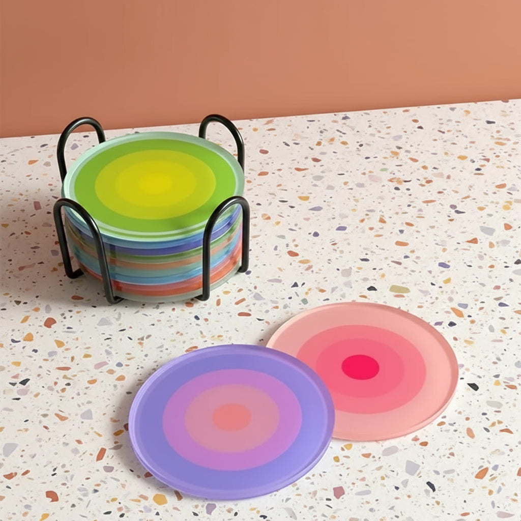 Colorful silicone coasters with a stand on a white background