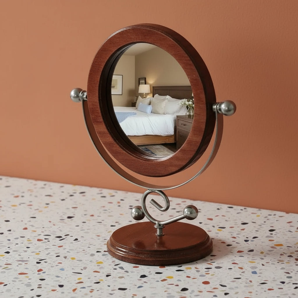Round wooden-framed mirror on a stand with a bedroom reflection