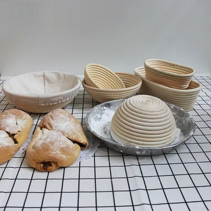 Baked bread and bread-making containers on a checkered tablecloth