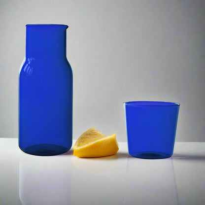 Blue glass container with dimensions labeled