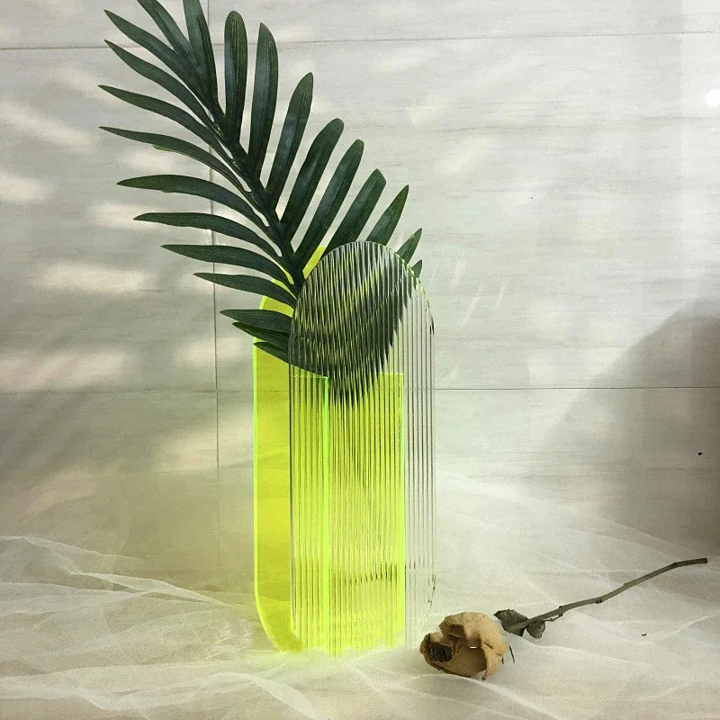 Neon green vase on white backdrop 