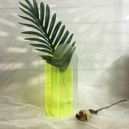 Neon green vase on white backdrop 