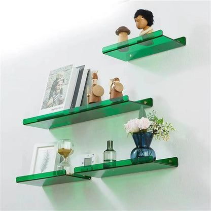 Green shelves on a white wall displaying various amenities