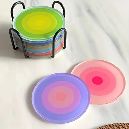 Colorful silicone coasters with a stand on a white background