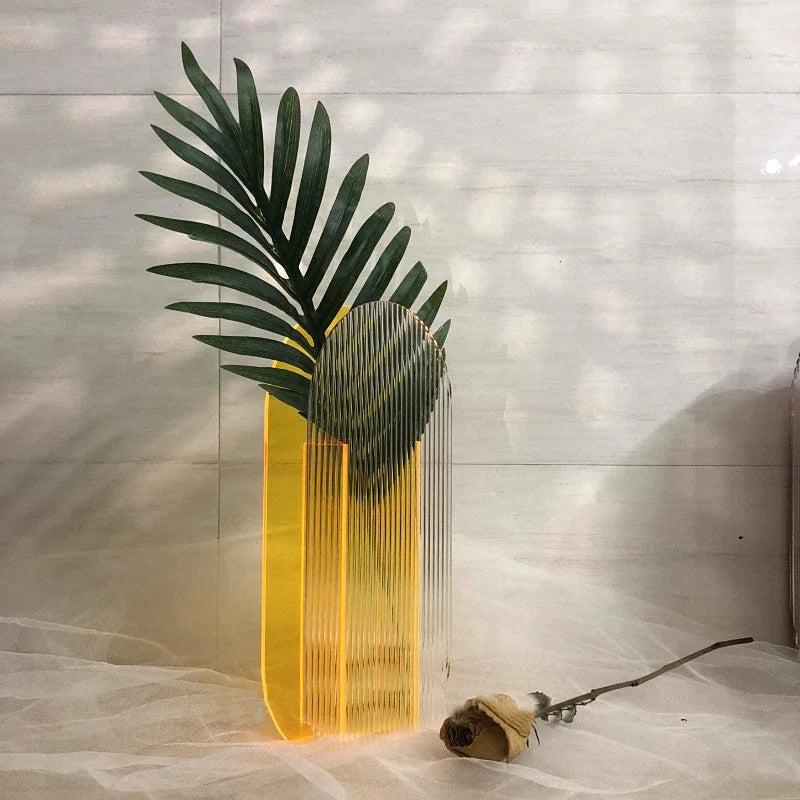 Yellow orange vase on white backdrop 