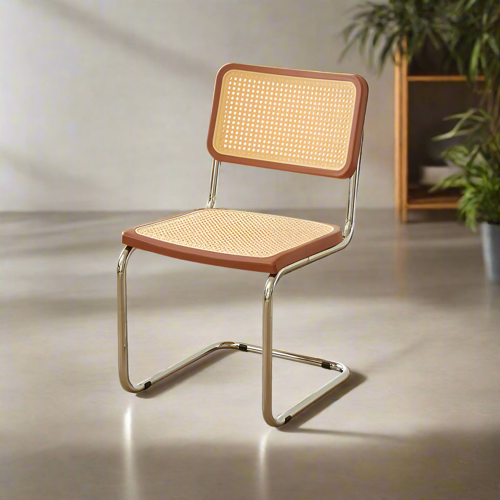 Chair with wicker seat and backrest on a light gray background