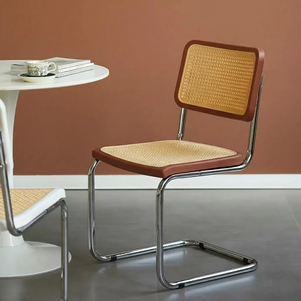 Chair with wicker back and seat in a minimalistic setting