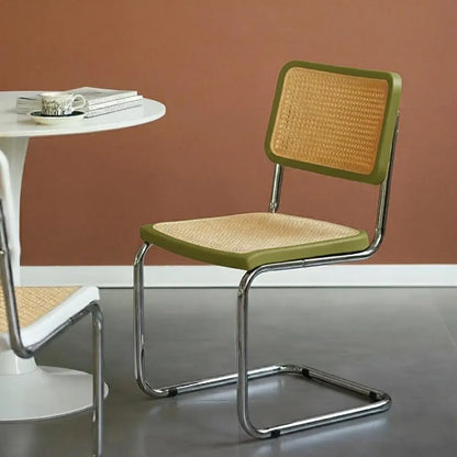 Chair with wicker back and seat in a minimalistic setting