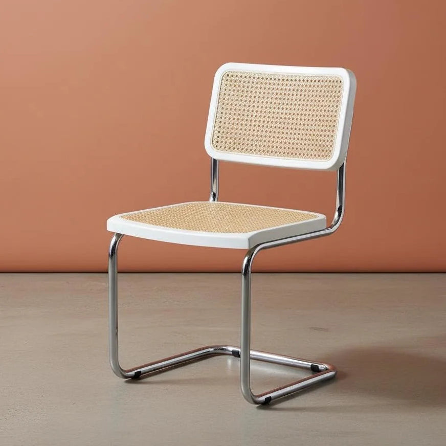 Chair with wicker backrest and seat on a brown background